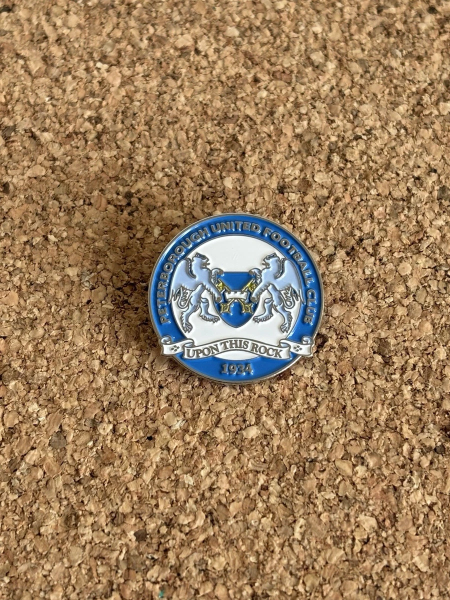 Pin badges on a peterborough united fans hat hi-res stock photography and images