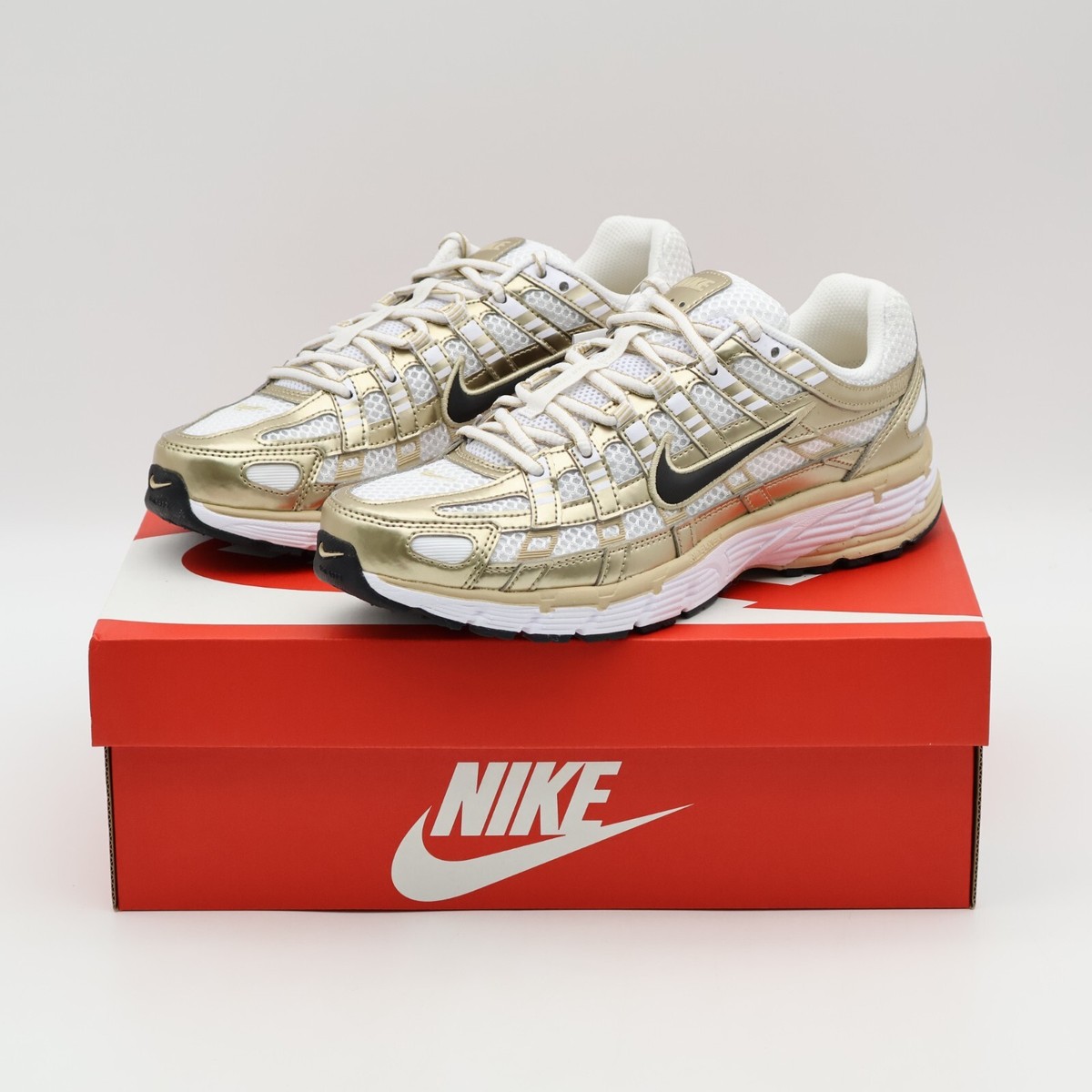 nike p600 gold
