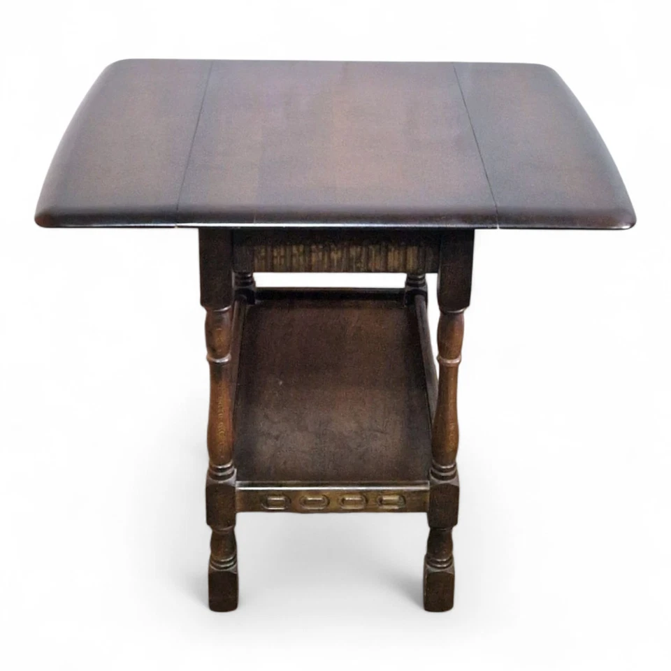 Vintage 2 tier carved oak folding occasional table / trolley with drawer - Image 4 of 4