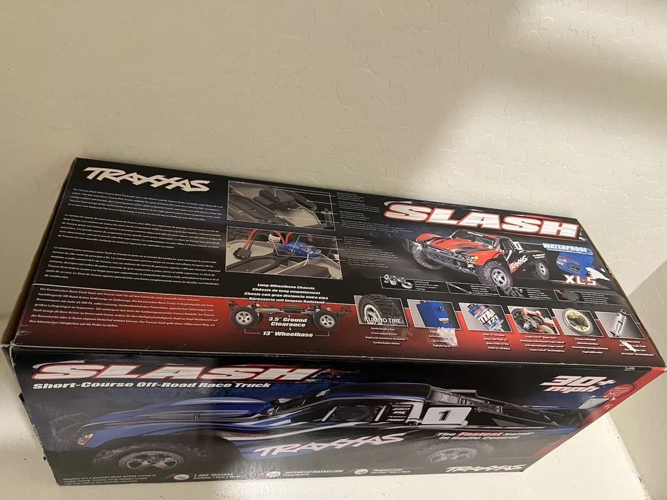 Traxxas Slash 1/10 VXL azul con control remoto, pico EZ con cargador, caja, accesorios Foto 2 de 4