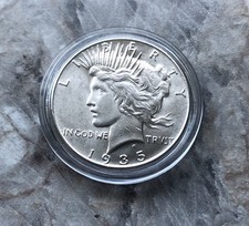 1935 SILVER PEACE DOLLAR IN BU CONDITION.