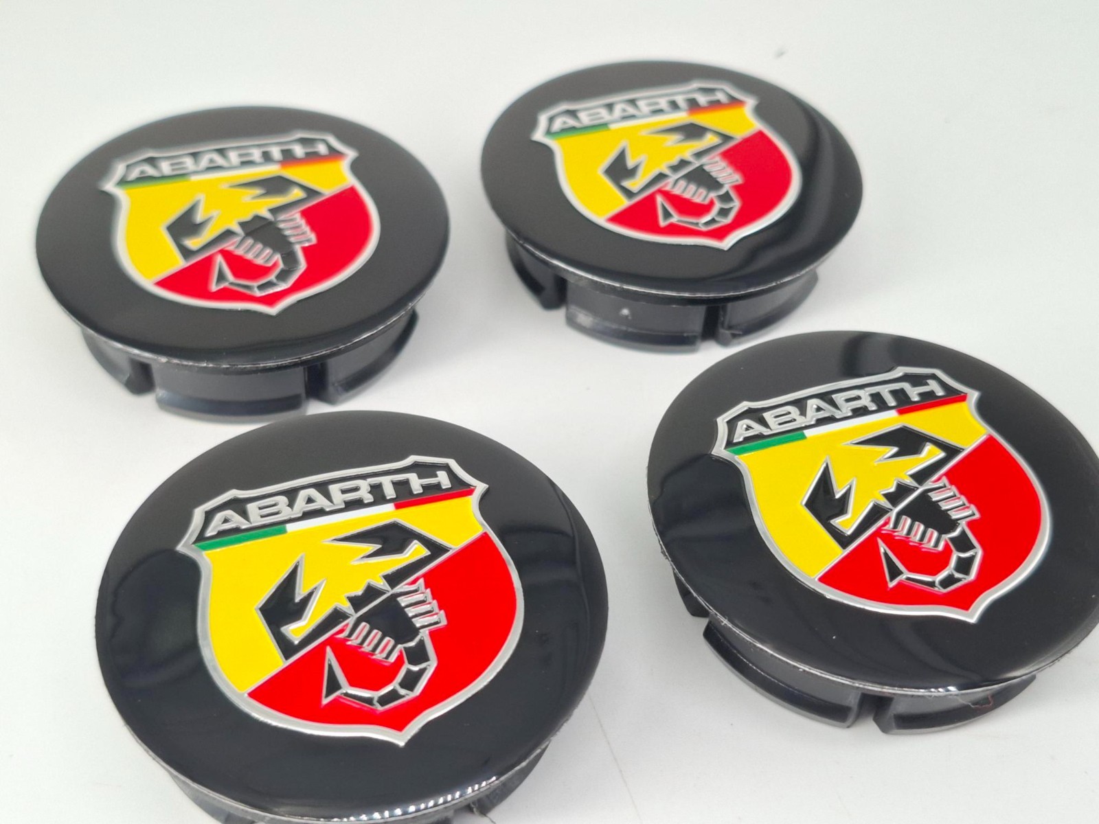 4 tappi coprimozzo Abarth 50mm per cerchi in lega foto 2