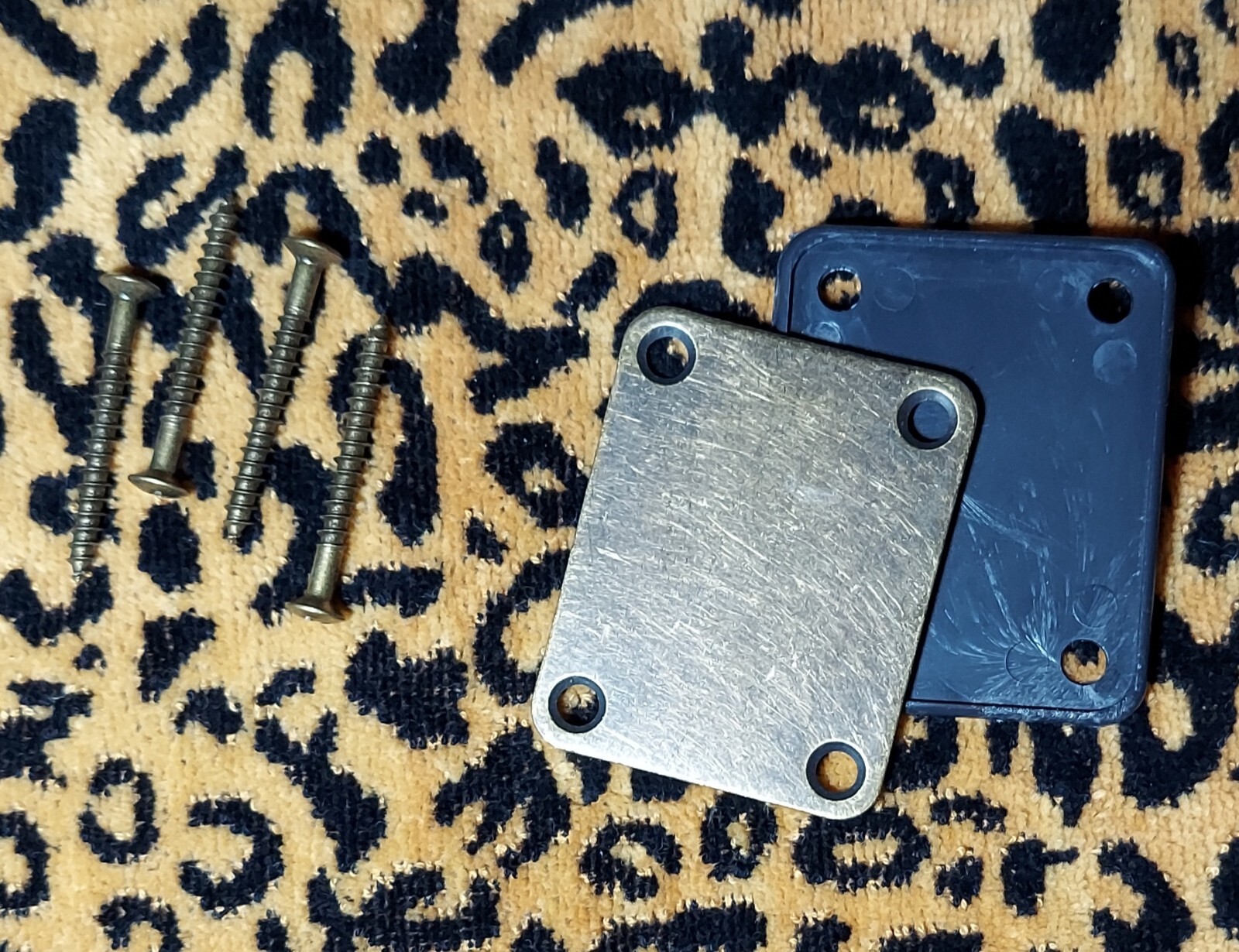 brushed bronze brass guitar neck plate aged rustic with screws and shield plate