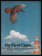 1985 Austin Nichols Wild Turkey Whiskey Fly First Class Vintage Print Ad