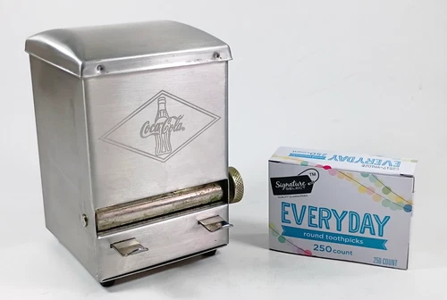 Vintage Coca-Cola Stainless Steel Turn Knob Toothpick Dispenser with Toothpicks.