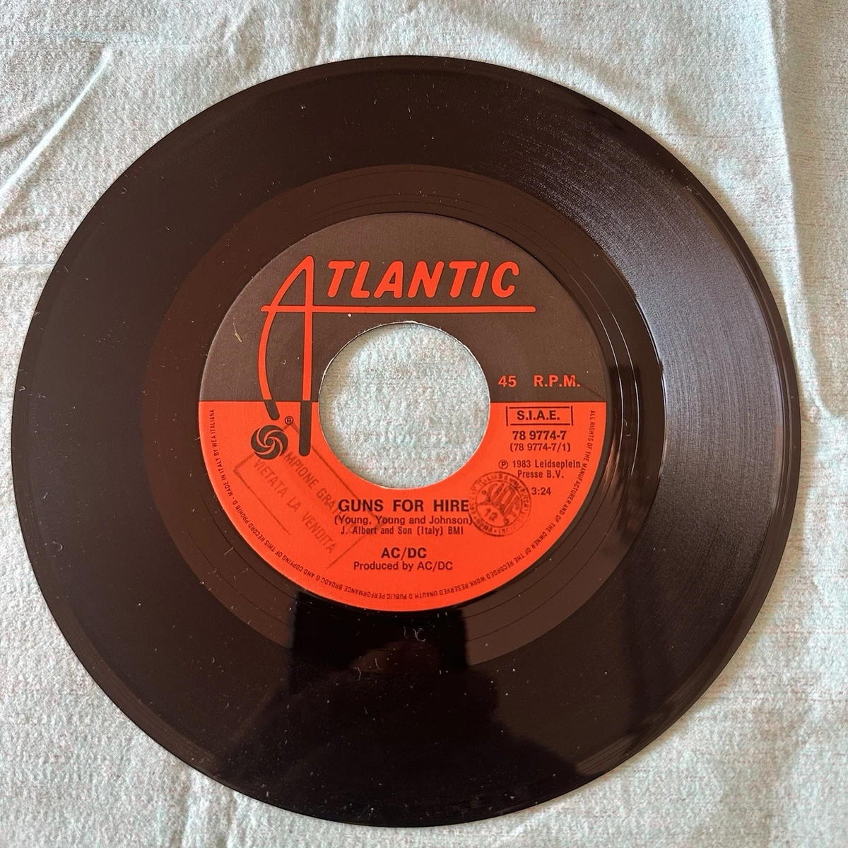 AC/DC – Guns For Hire ©1983 Made in Italy - Atlantic – 78 9774-7
