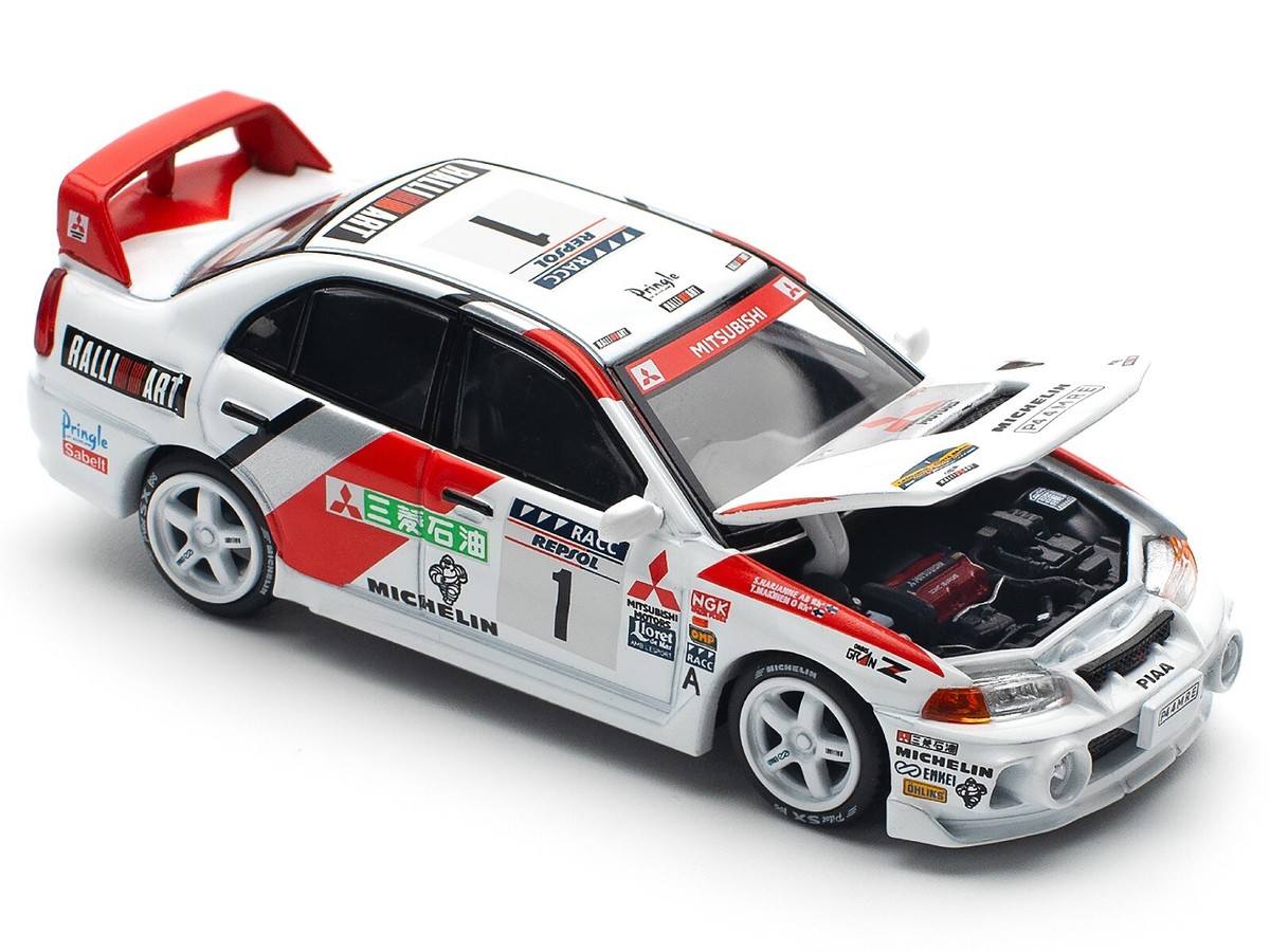MITSUBISHI LANCER EVO IV RHD #1 WINNER RALLY CATALUNYA 1/64 BY POP