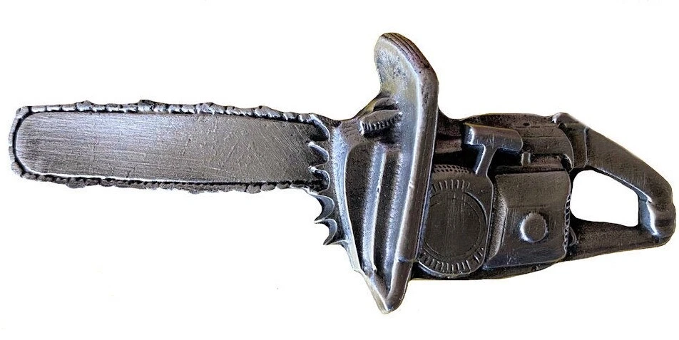 Chainsaw clearance belt buckle