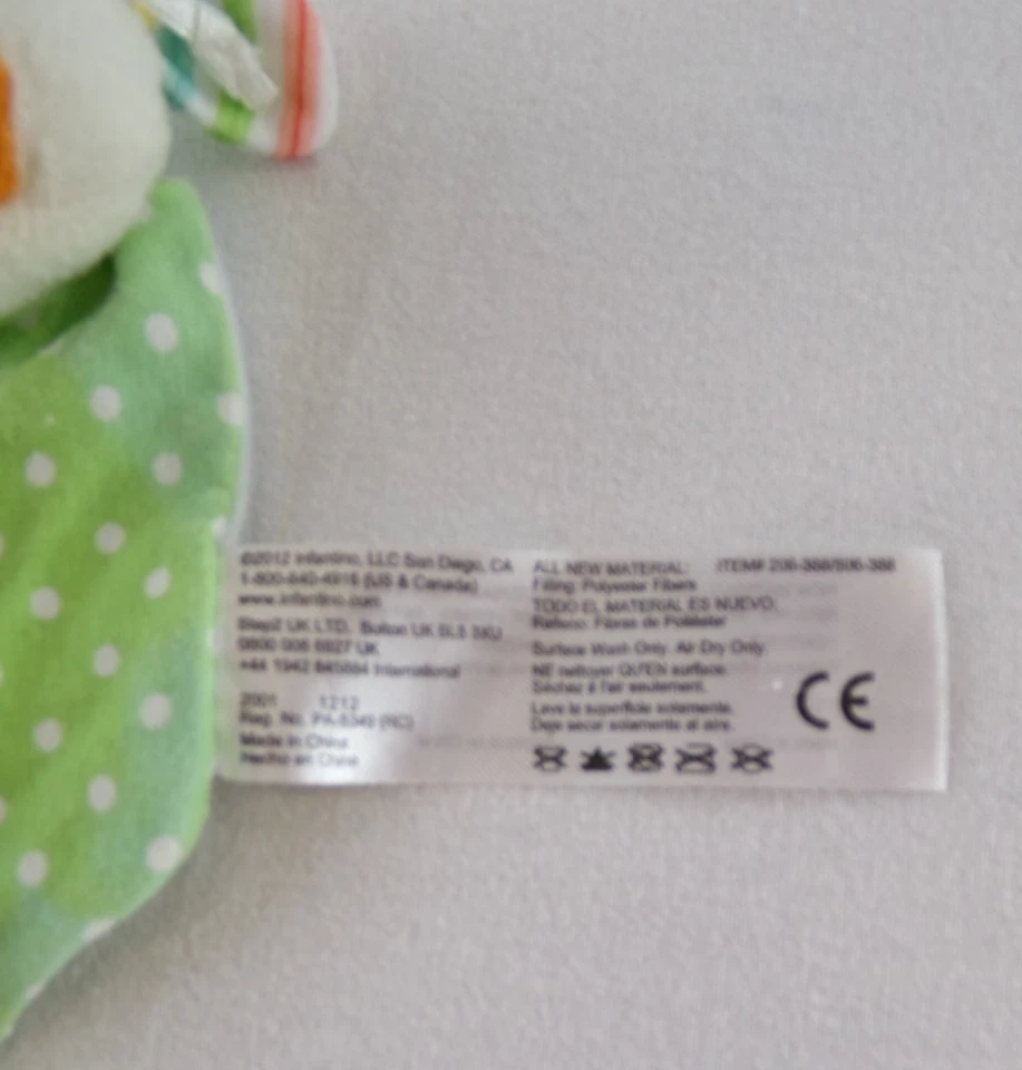 Lote de 2 sonajeros de muñeca pies sonajeros atrevidos Playgro Infantino para desarrollo - usados en excelente estado Foto 4 de 4