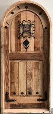 Rustic castle reclaimed lumber arched old growth Doug Fir solid door winery