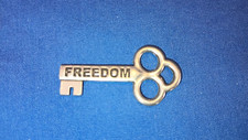 FREEDOM KEY FOR CHARM OR PENDANT~silver tone, marked Metal Morphosis