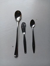 3 pc stainless utensil lot. Baby spoon, iced tea spoon, butter knife. 480