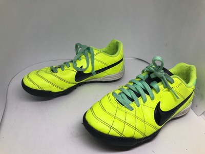 yellow nike astro turf