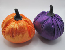 NEW APPROX. 3.25" IN DIAMETER LOT OF 2 METALLIC ORANGE PURPLE PLUSH PUMPKINS