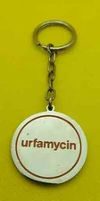 Urfamycin- Pharmaceutical Industries, old vintage metal keychains !