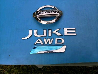 NISSAN JUKE SV CHROME AWD 2012 LETTERING REAR EMBLEM W PURE DRIVE LOGO OEM USED 