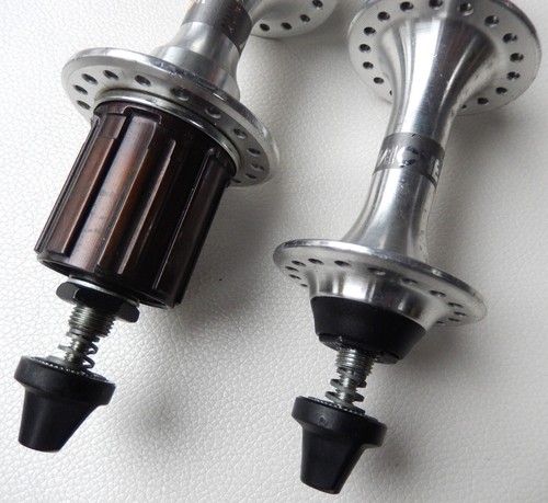 Pair Of Hubs MICHE Team 36 Holes 8 Speed +2 Blockages Axle 131 New - Photo 3 sur 3