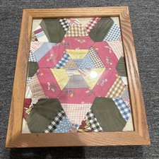 Framed hand, quilted piece