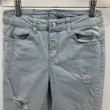 Pantalones de mezclilla ajustados DKNY para niñas azul claro elásticos desgastados tiro medio cómodos
