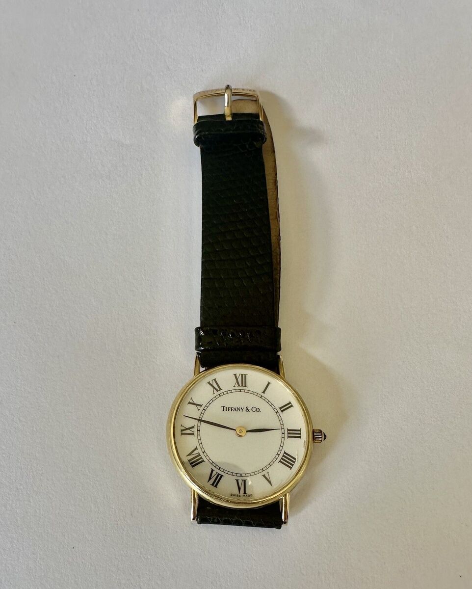 TIFFANY & Co. - 14K YELLOW GOLD WRISTWATCH with GENUINE TIFFANY & Co. - 14K YELLOW GOLD WRISTWATCH with GENUINE