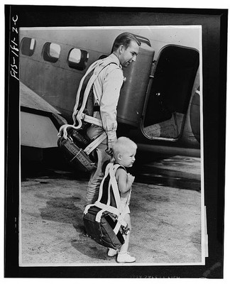 Photo:1940s Father Child Parachute Jump Pilot Airplane Boarding Plane