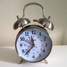 Sharp SPC800 Quartz Twin Bell Analog Alarm Clock, Silver Round Metal Frame