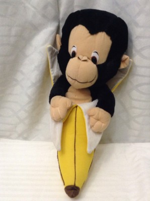 old monkey toy with banana