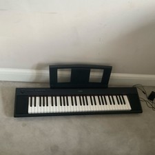 Yamaha Piaggero NP-12 61-Key Semi-Weighted Compact Keyboard Black AC Adaptor