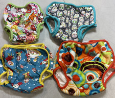 4 Gen-Y Cloth Covers 3 Large  1 X Large  All Are Adjustable