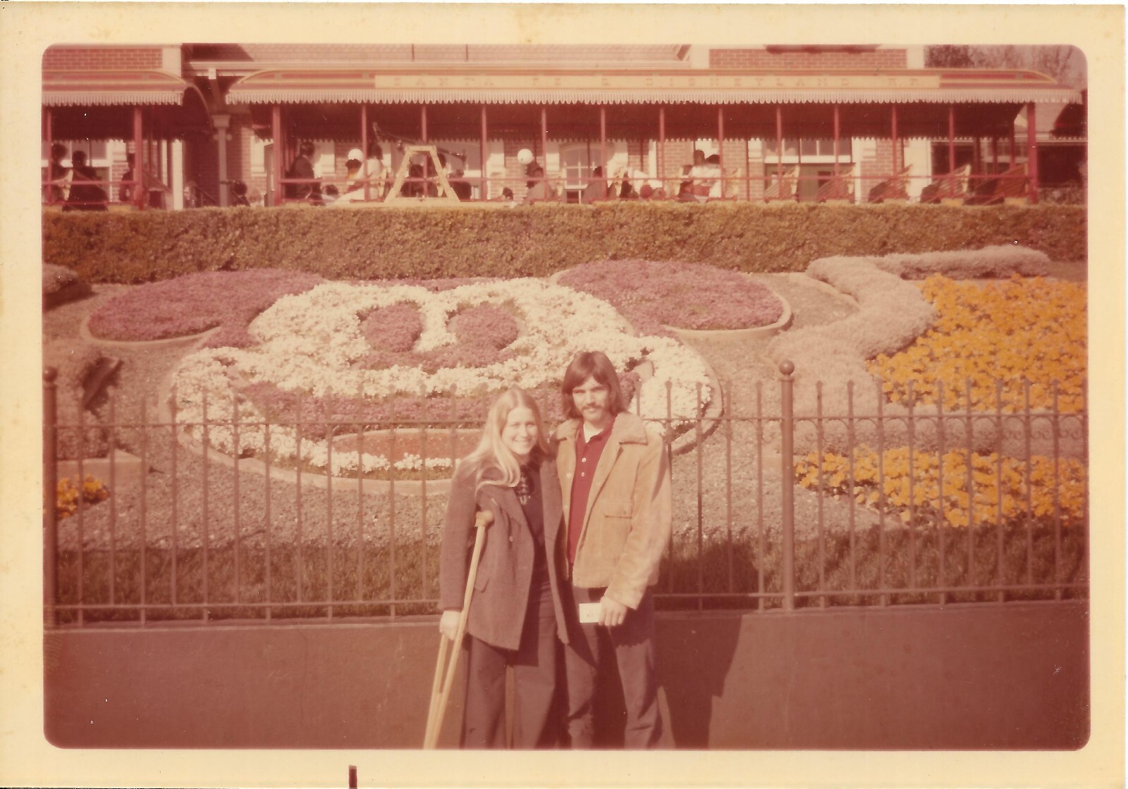 vintage color photo man woman crutches Disneyland California eBay