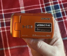 Sony Webbie HD MHS-CM1 Orange Digital Video Camcorder 5MP Tested Works W/ Charge