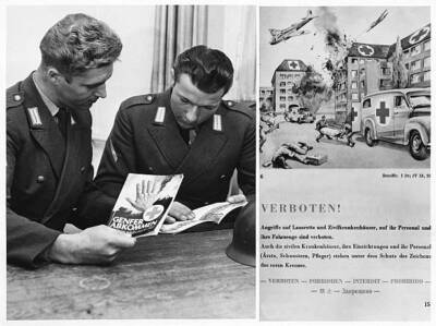 Two Bundeswehr soldiers with the International Law Primer publis - 1958 Photo