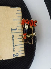 ROCK N ROLL BAND AC/DC GUITARIST PIN BY BROCKUM