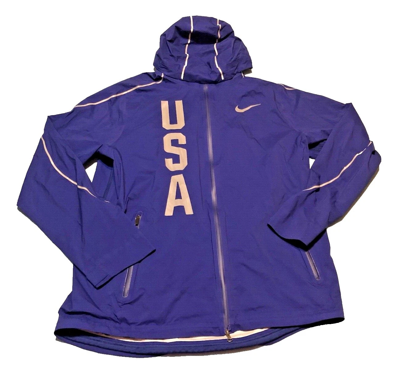 Nike corriendo en ropa para aficionados y recuerdos de los Juegos Olímpicos