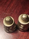 A Group Of 4 Salt And Pepper Shakers — photo 9