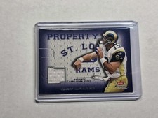 2001 Fleer Focus Property Of  GAME USED JERSEY KURT WARNER #POKW HOF! RAMS!