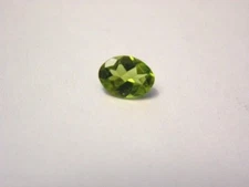 Peridot gemstone all natural India faceted 8x6mm oval