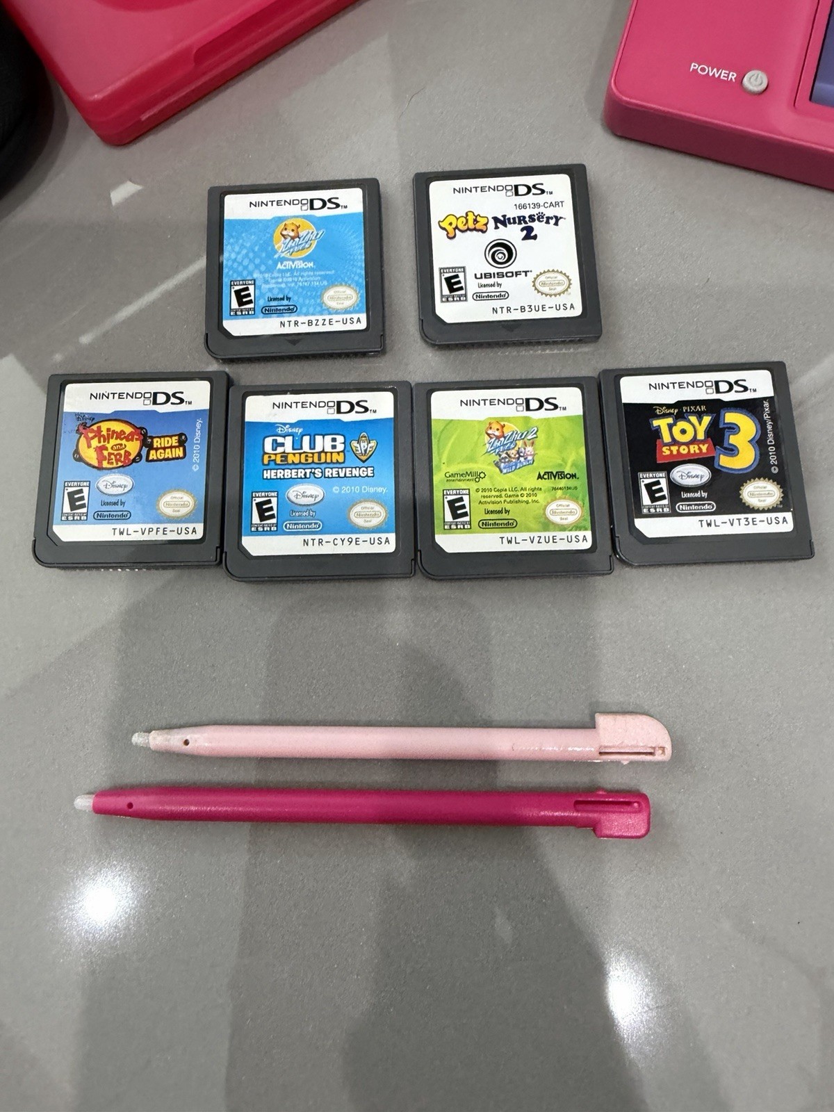 Nintendo DSi Pink Handheld System with 6 Games
