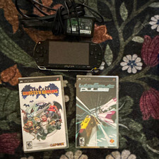 Sony PSP 1001 Handheld Console Bundle w/ AC Adapter, 2 Games & Game Cases