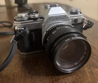 Canon AE-1 35mm SLR Film Camera with Canon 50mm 1:1.4 Sky 1-A Lens #791235