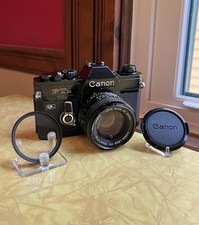 Canon FTb QL 35mm Film SLR Camera in Black w/ Canon Lens FD 50mm 1.4 Canon Cap