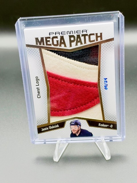 2025-26 UD Premier #PMP-OL Jamie Oleksiak Premier Mega Patch Chest Logo #/24