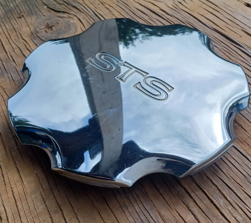 Tapa central Cadillac Seville El Dorado STS, 1996-2002 parte # 9592206 02 dañada Foto 2 de 3