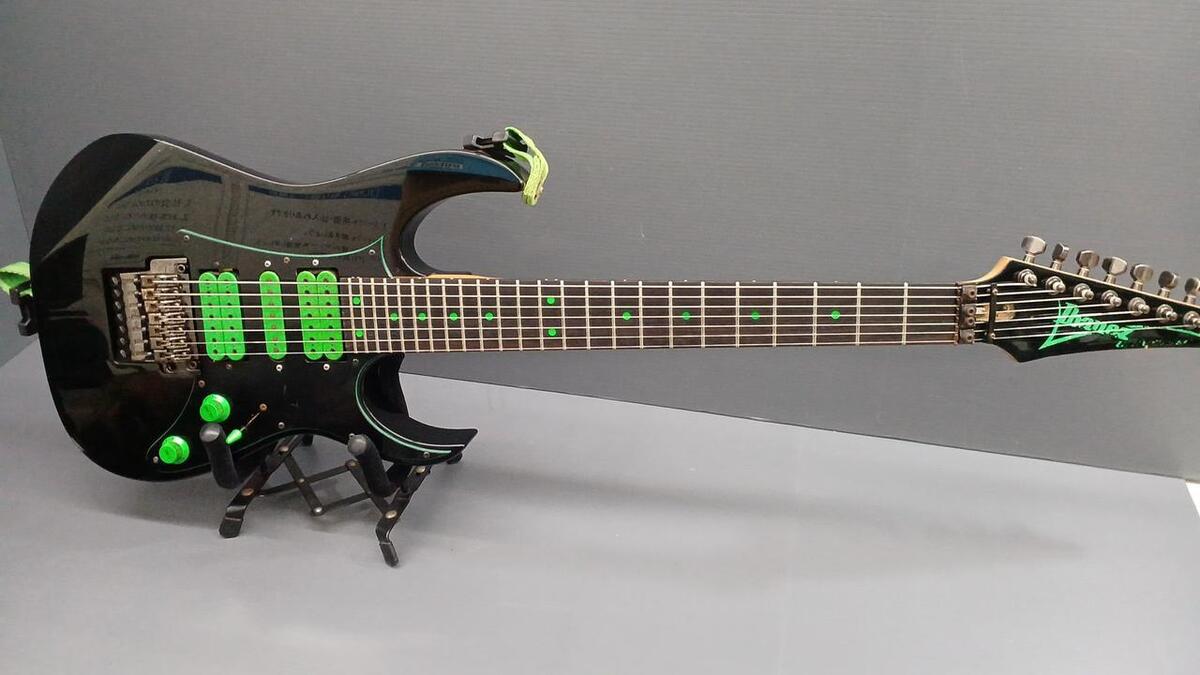 Vintage 1990s Ibanez UV7 Electric Guitar With Armbar Strap Vintage 1990s Ibanez UV7 Electric Guitar With Armbar Strap