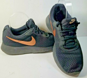 nike tanjun womens black and bronze
