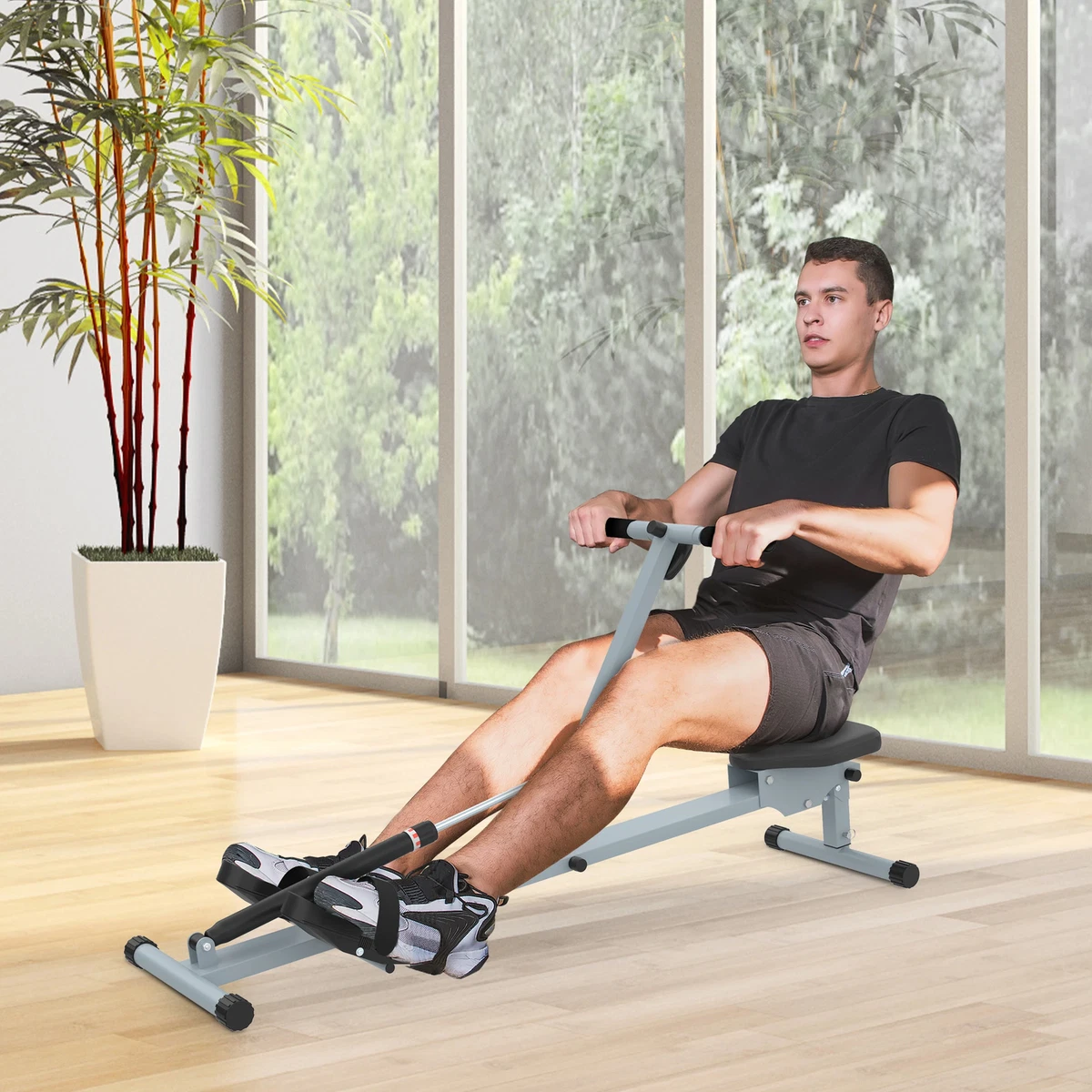 Compact clearance rowing machine
