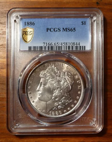 1886 Morgan Silver Dollar $1 ~ NGC Graded MS65 Gold Shield