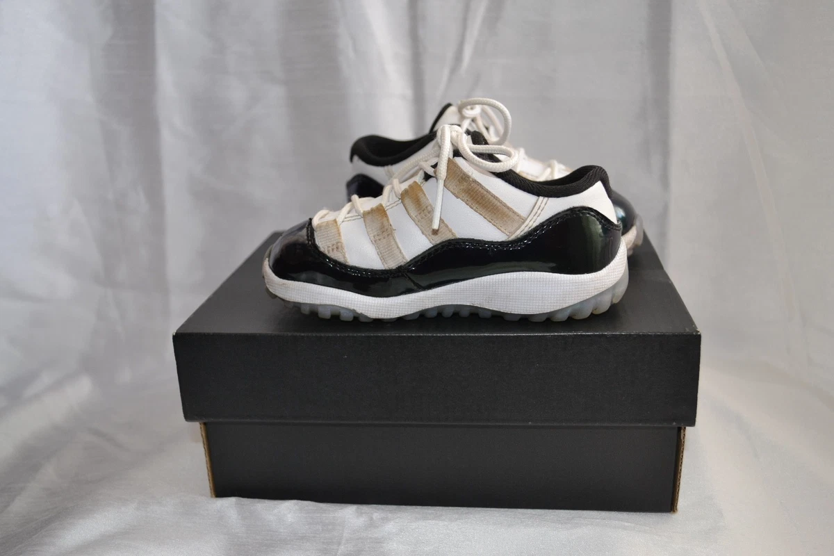 Jordan retro 11 top low emerald rise