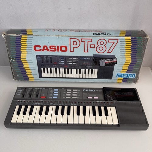 Casio PT-87 Electronic Keyboard With ROM Pack RO-551 World Songs Boxed Working