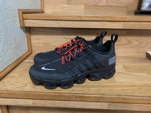 black and red vapormax utility